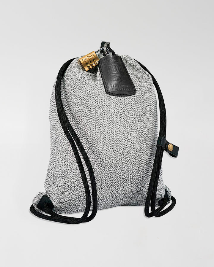 The Theft-Proof Drawstring Backpack by LOCTOTE INDUSTRIAL BAG CO. » FAQ —  Kickstarter